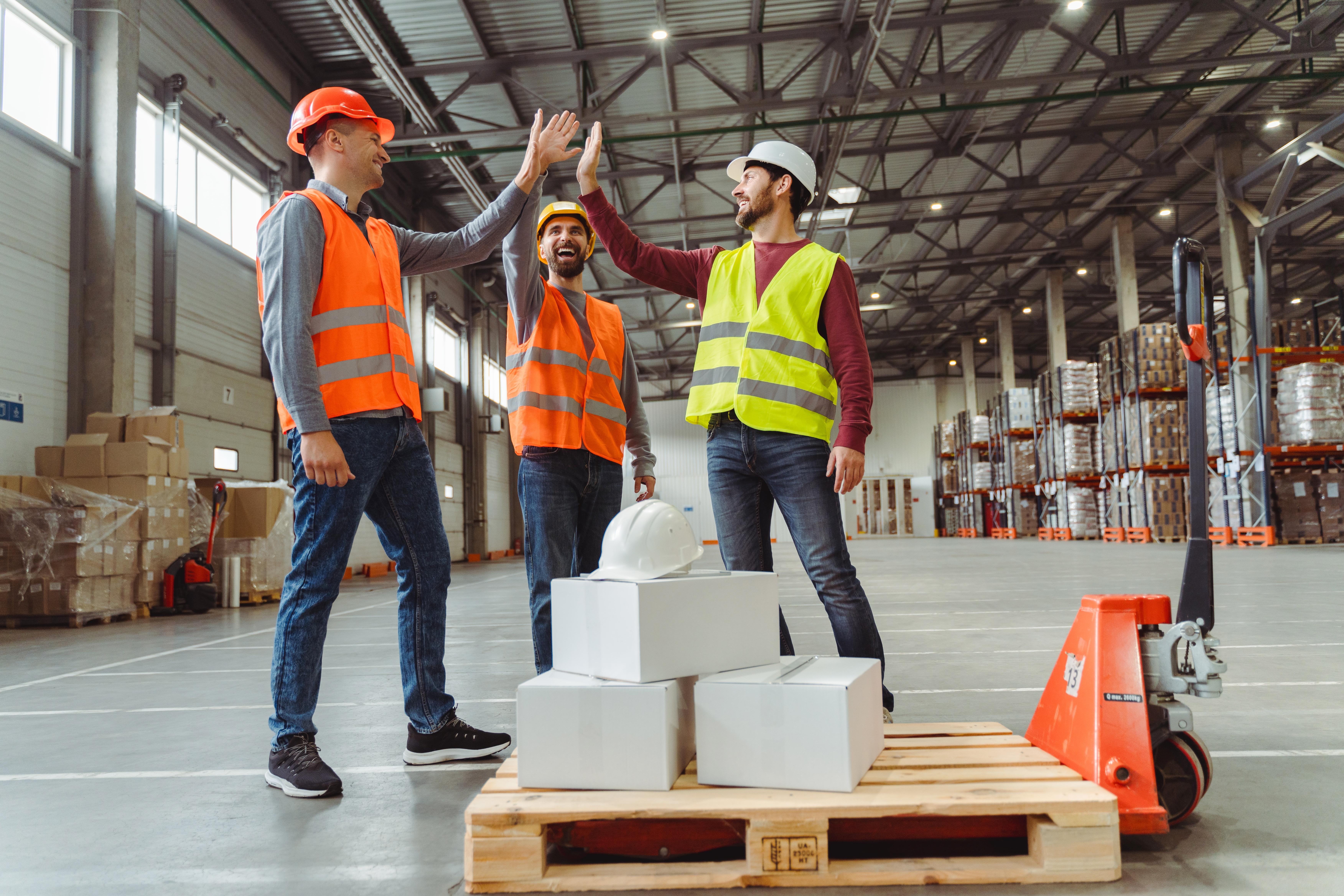 Happy team in warehouse 